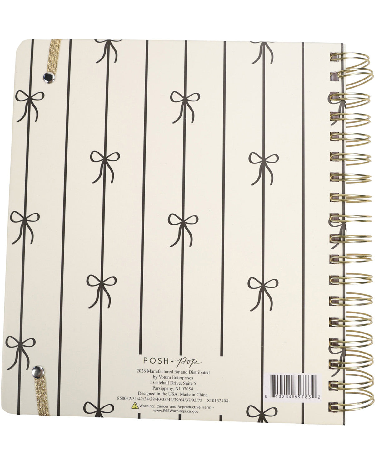 Notebook with bow pattern and spiral binding on a white background