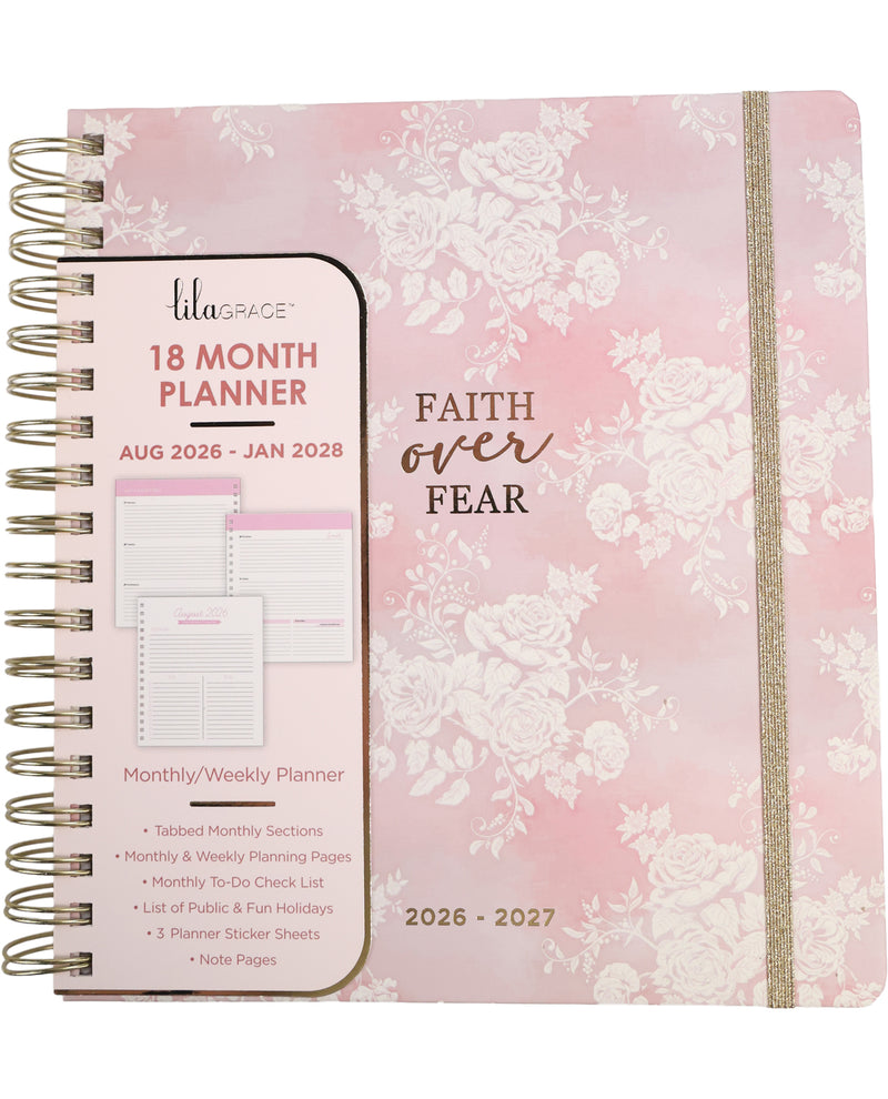 Planner with floral design and 'Faith Over Fear' text on a pink background