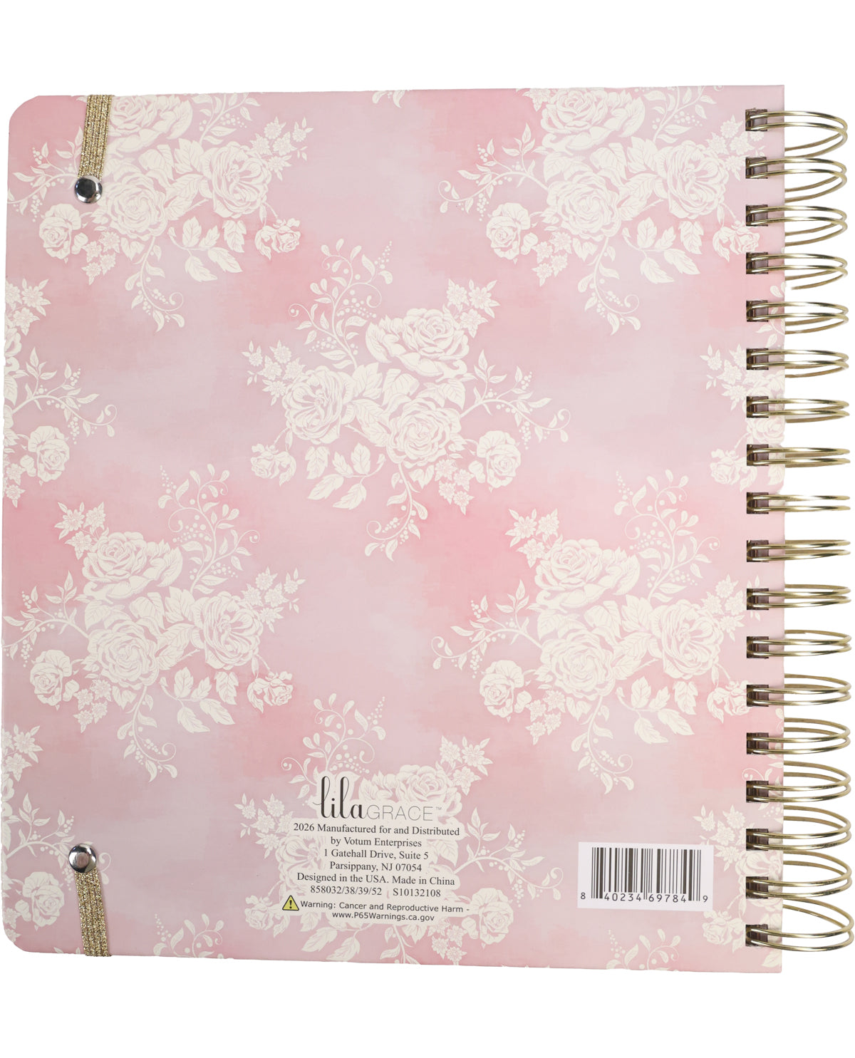 Pink notebook with floral pattern and gold spiral binding