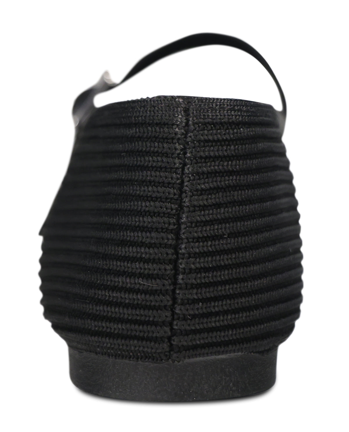 Black woven flat shoe shown from a rear three-quarter angle against a plain white background.