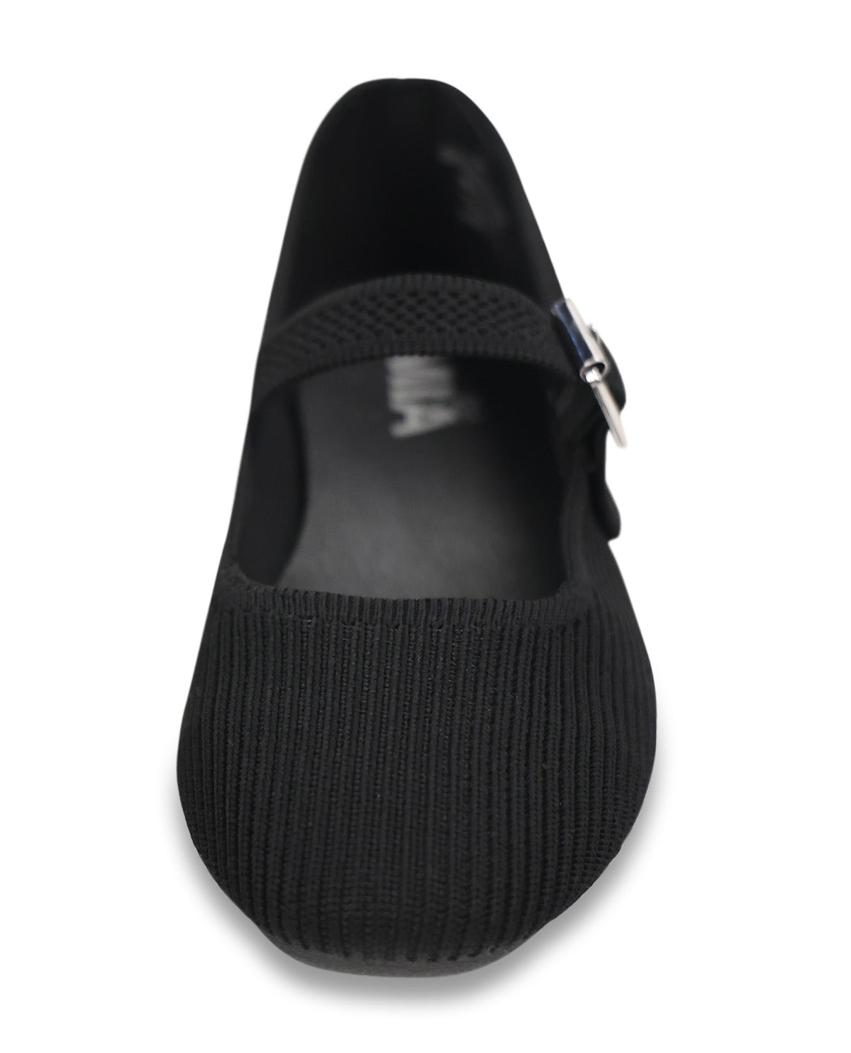 A single black knit Mary Jane flat shoe with a textured knit toe and heel, a black elastic strap, and a small silver buckle, shown from a top-down view on a white background.