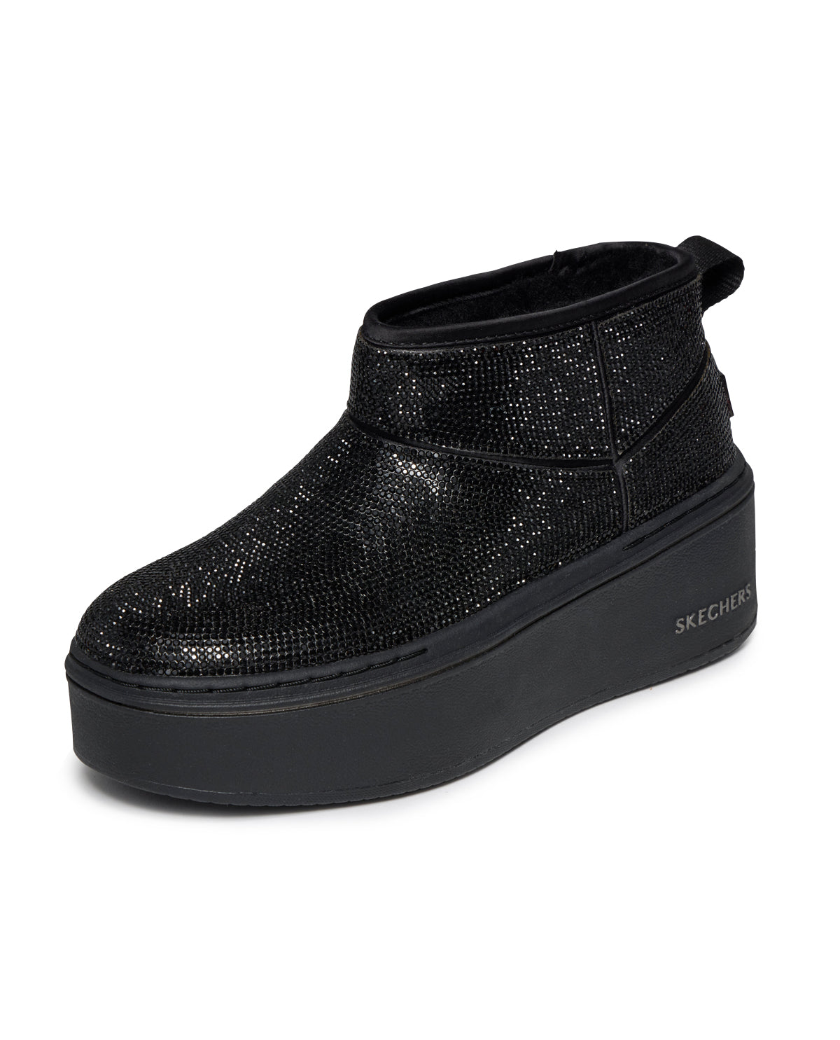 Black glittery sneaker with platform sole on a white background