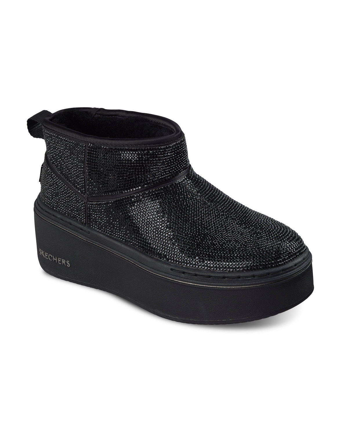 Black sneaker with platform sole on a white background