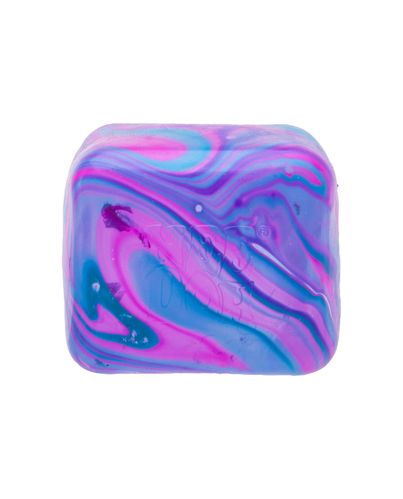 A square bar of soap with a marbled swirl pattern of pink, purple, blue, and light teal, isolated on a white background.