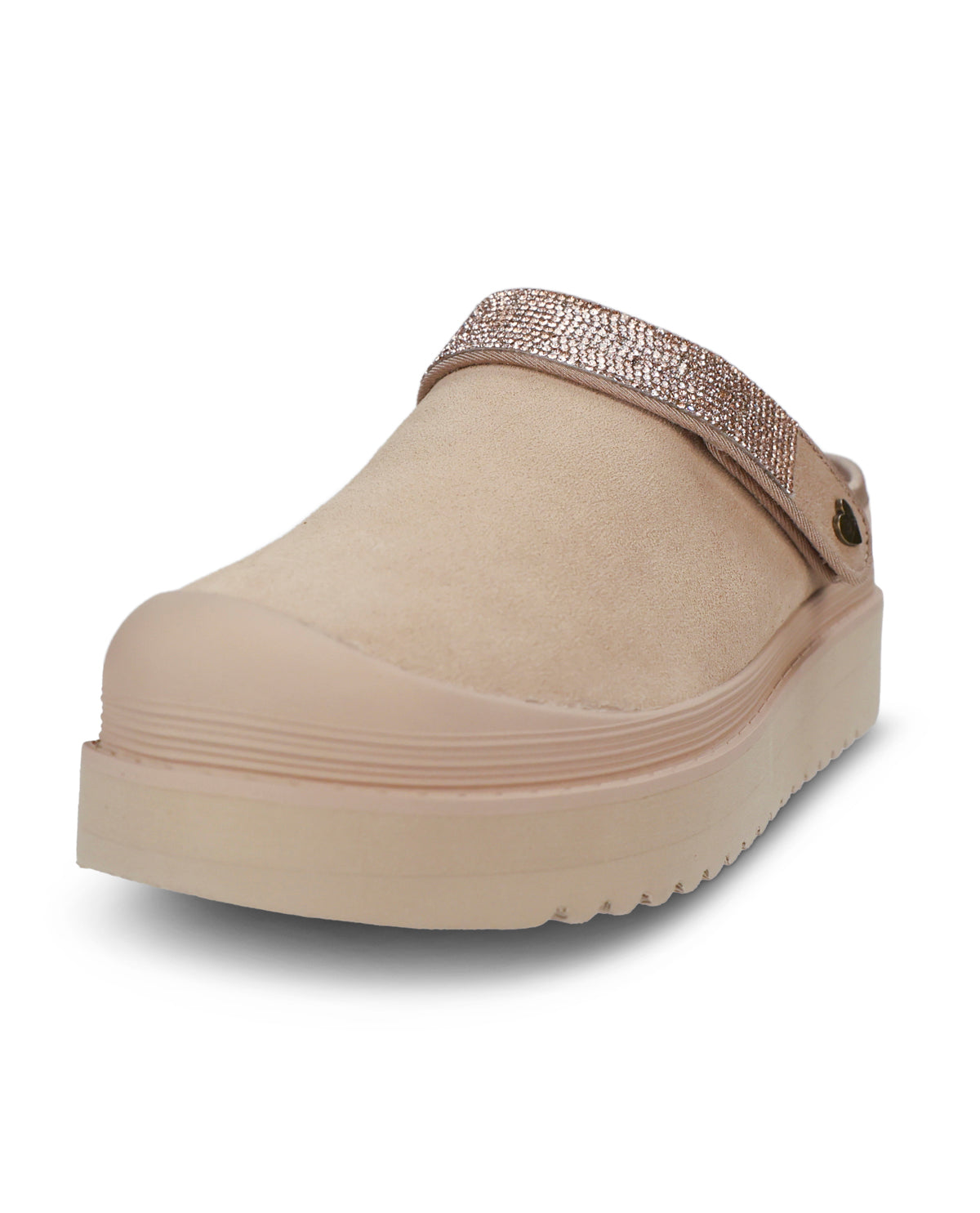 A single platform clog shoe in a light beige suede-like material, featuring a wide metallic rose gold rhinestone-embellished strap across the top and a thick beige platform sole, shown against a plain white background.