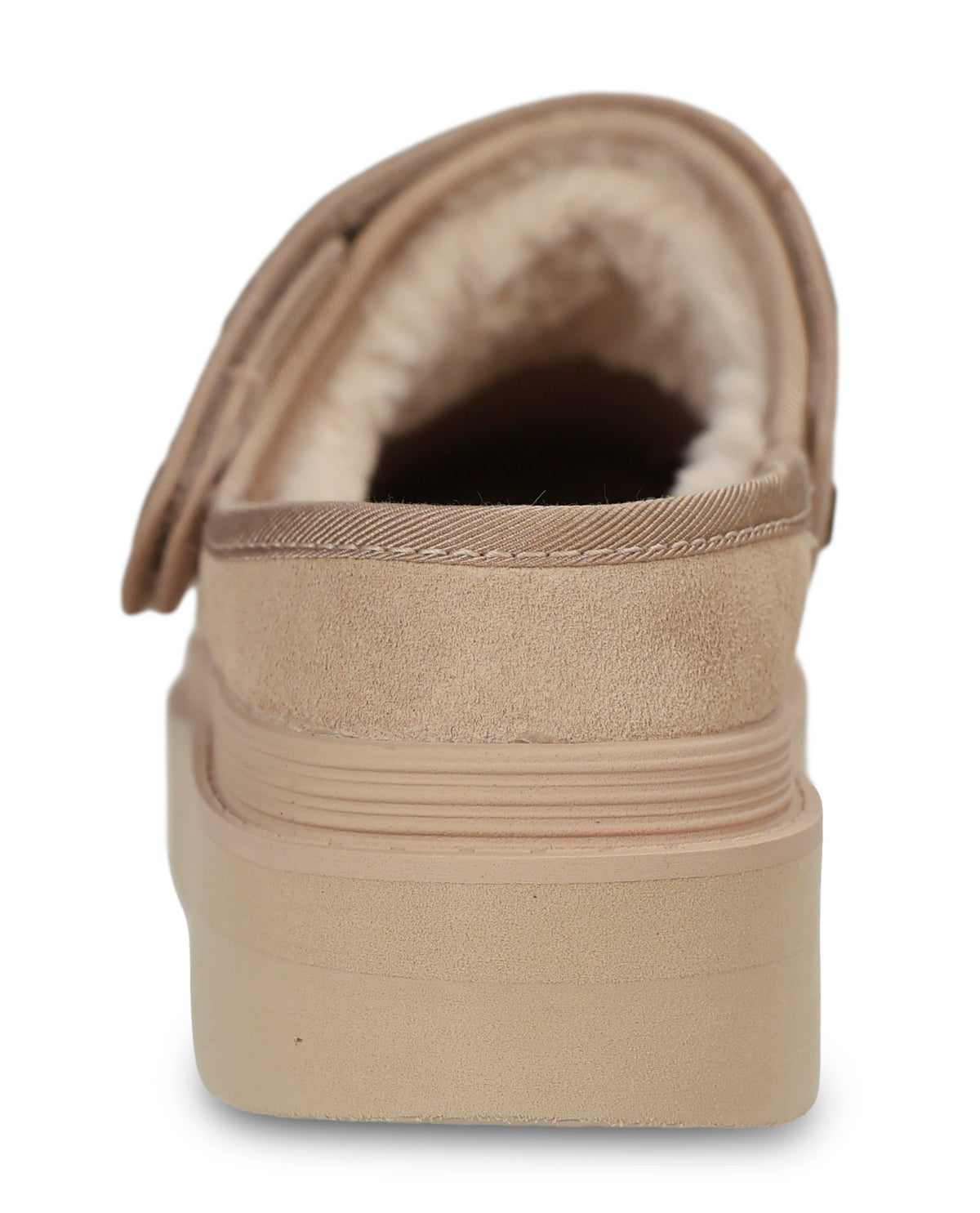 A beige slip-on shoe with a thick platform sole and a soft cream-colored shearling lining, shown from a rear three-quarter view on a white background.