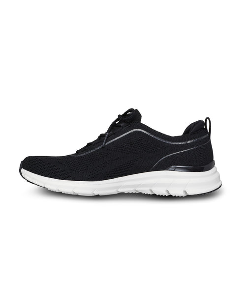 Black athletic shoe with white sole on a white background