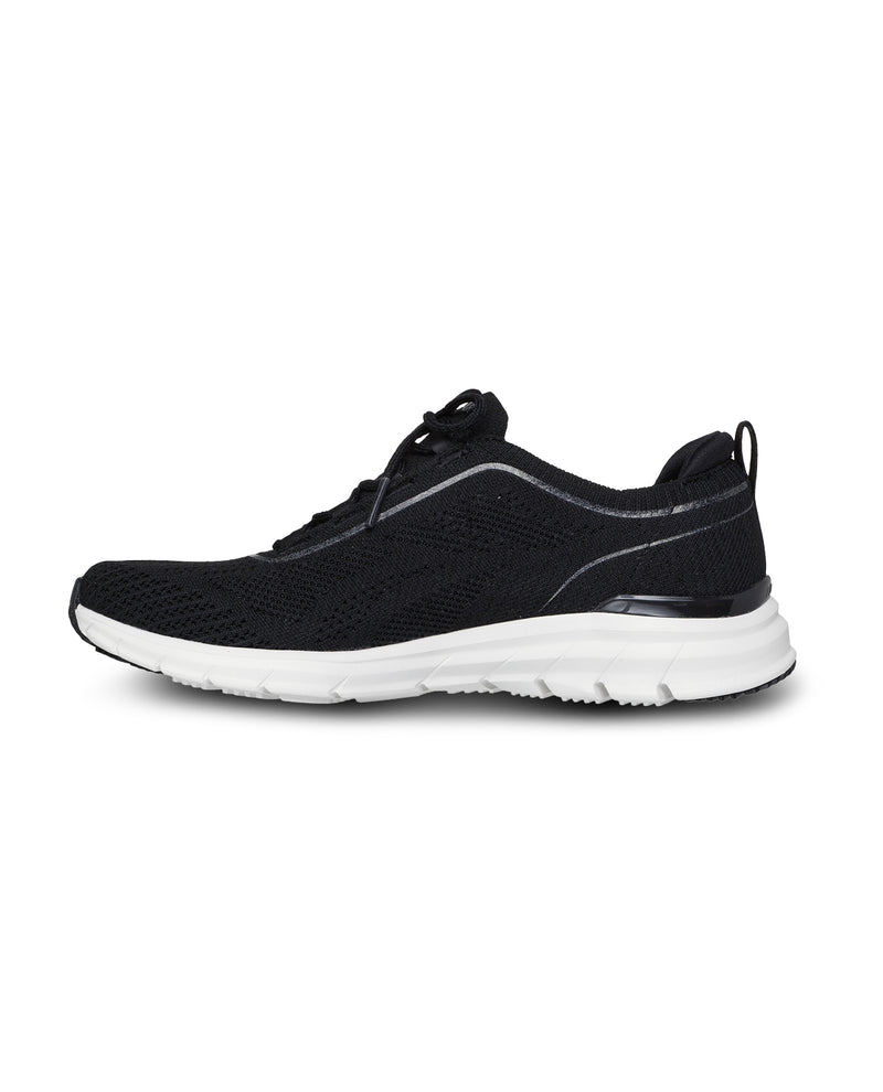 Black athletic shoe with white sole on a white background