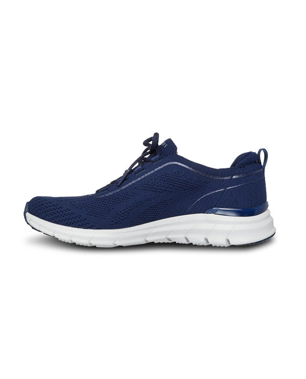 Navy sneaker with white sole on a light gray background