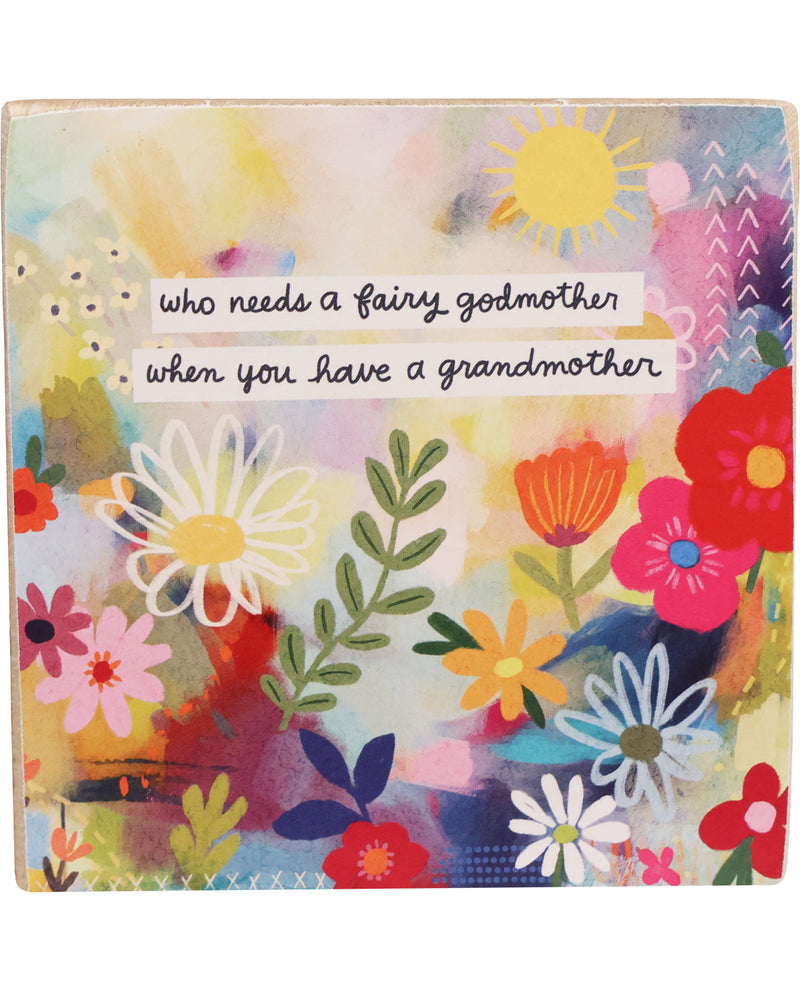 Colorful floral design with text 'who needs a fairy godmother when you have a grandmother' on a white background