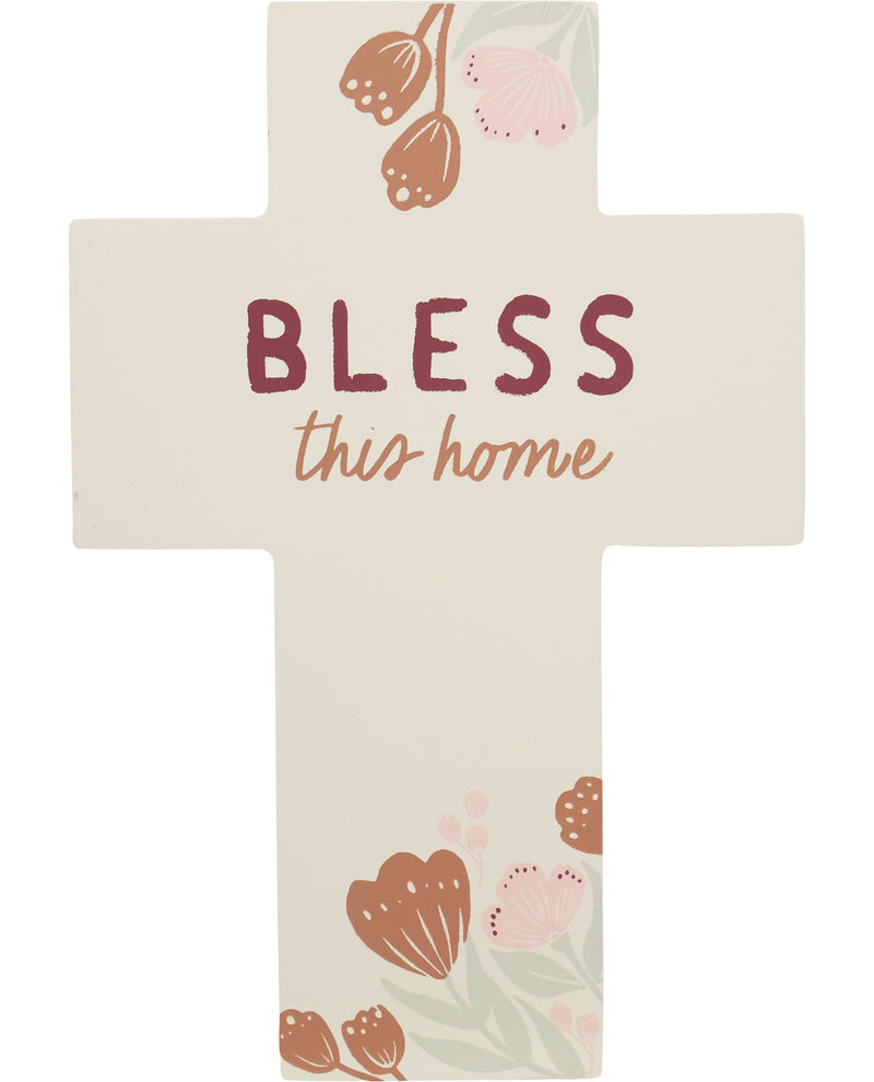 Decorative cross with 'Bless this home' text and floral designs on a white background