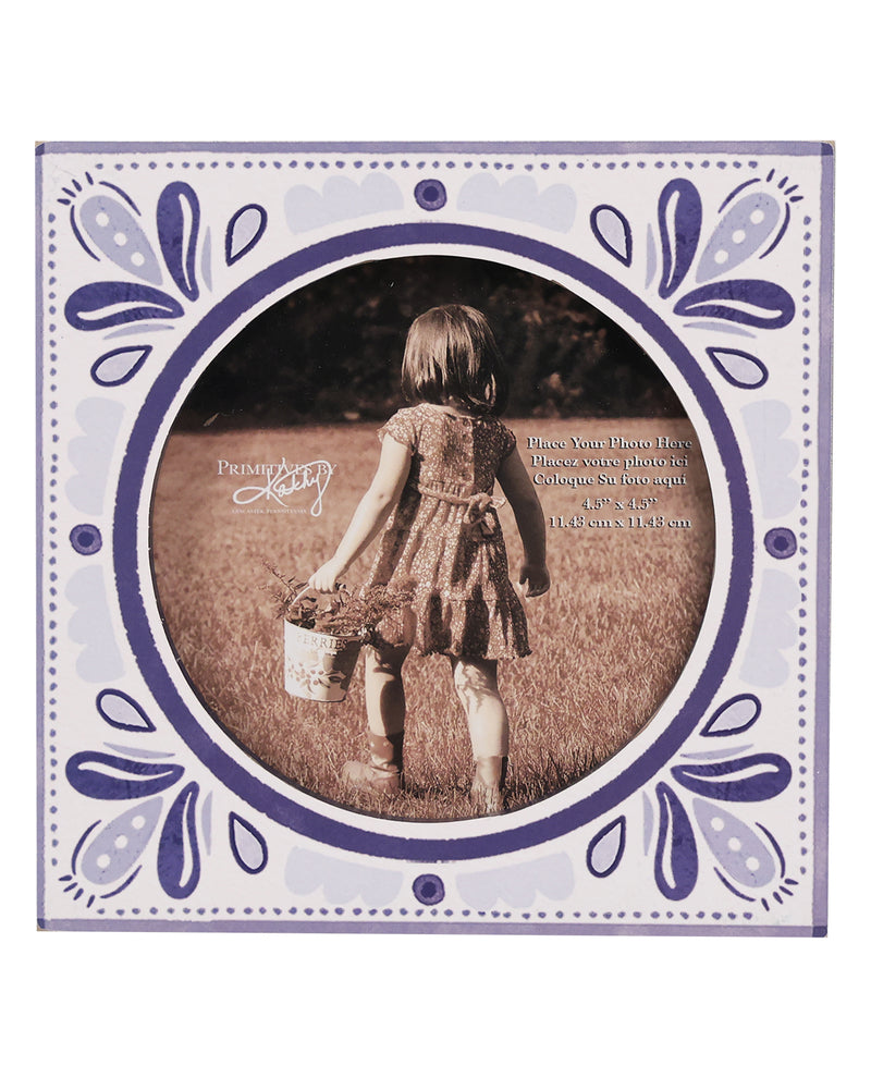 Decorative photo frame with a floral border featuring a vintage-style image of a girl holding a basket.