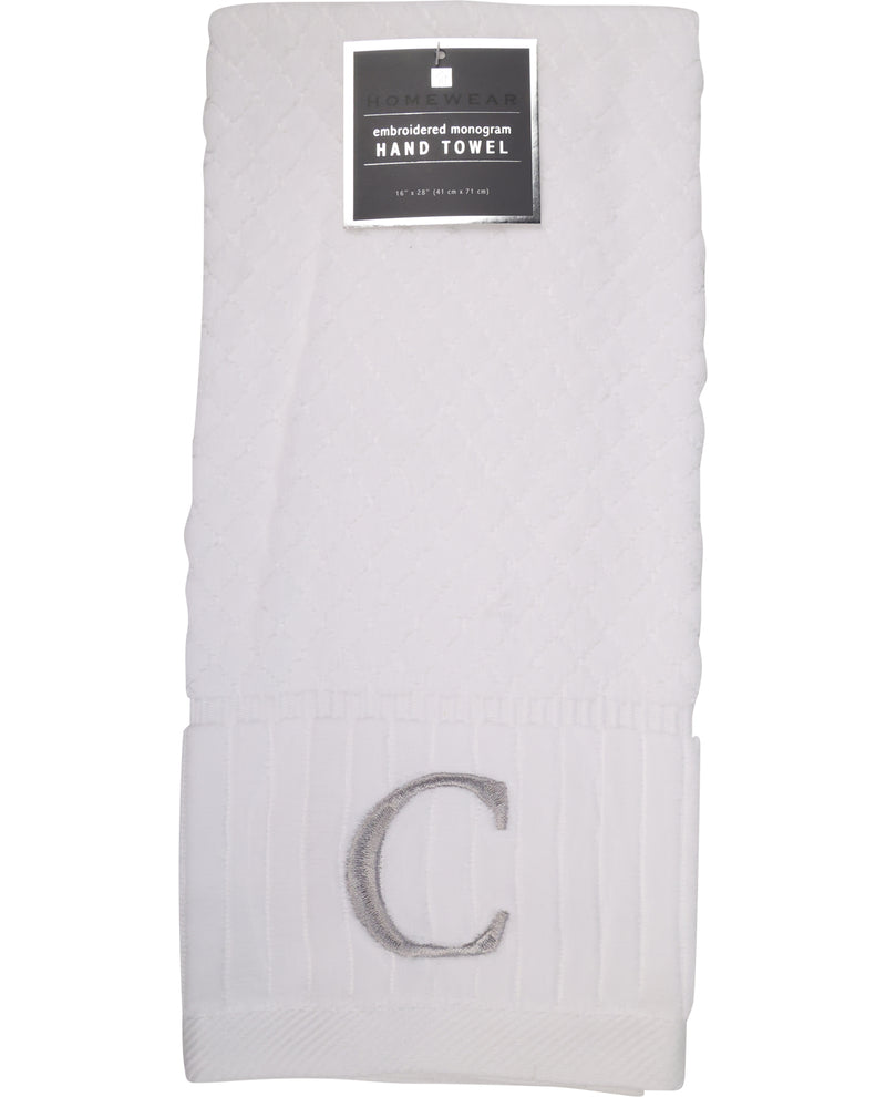 White hand towel with letter 'C' embroidery on a white background