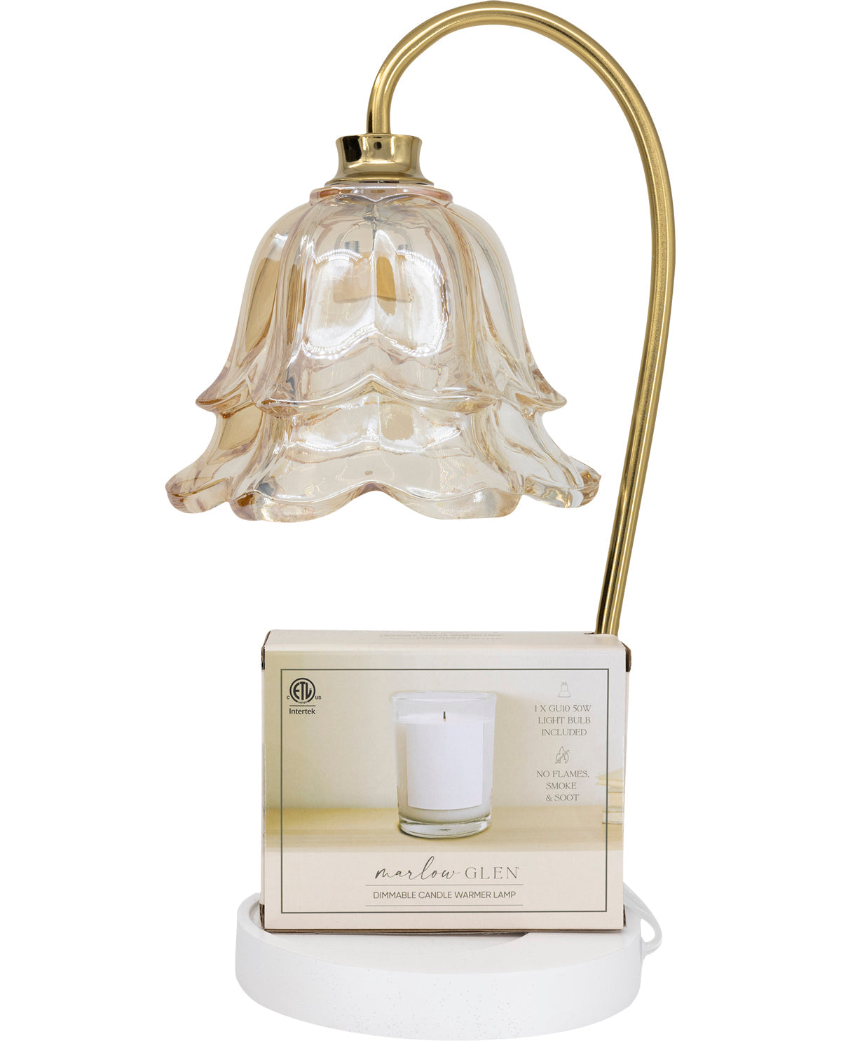 Decorative table lamp with a glass shade and white base on a white background