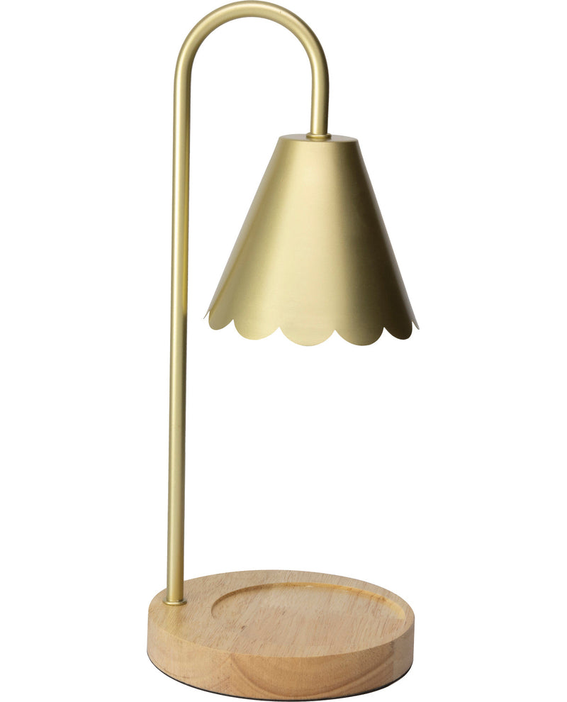 Gold table lamp with wooden base on a white background
