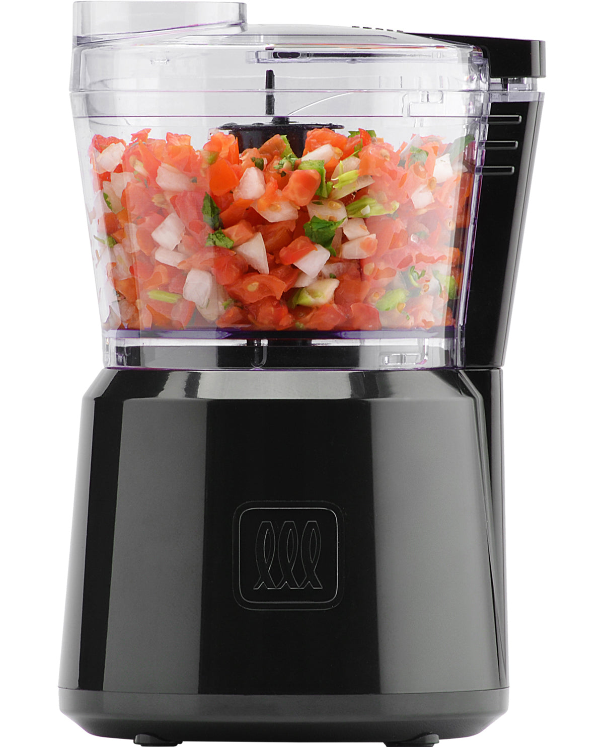 Black food processor with chopped vegetables inside on a white background