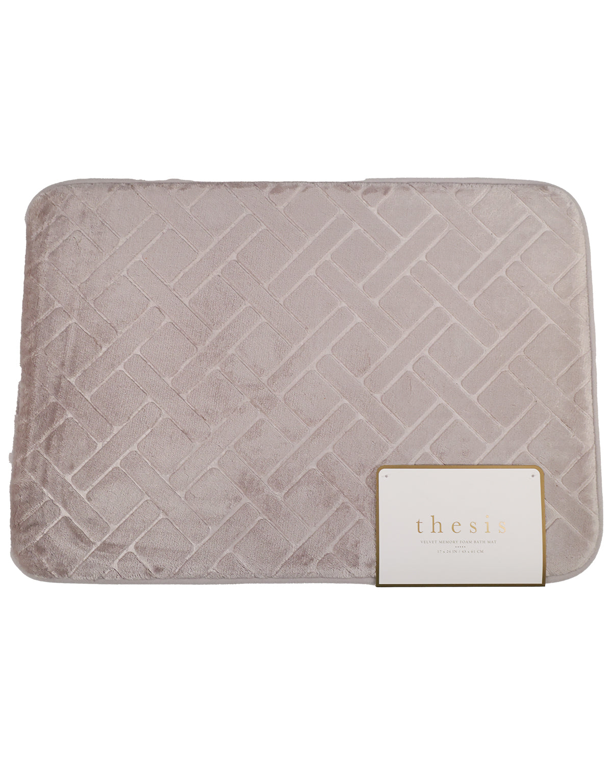 A square quilted cushion cover in a dusty mauve-pink velvet fabric, featuring a subtle diamond pattern and a white brand tag on the bottom right corner.
