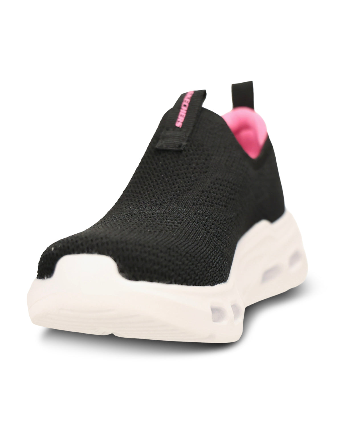 A black slip-on knit sneaker with a chunky white sole and a bright pink inner lining and pull tab accent.