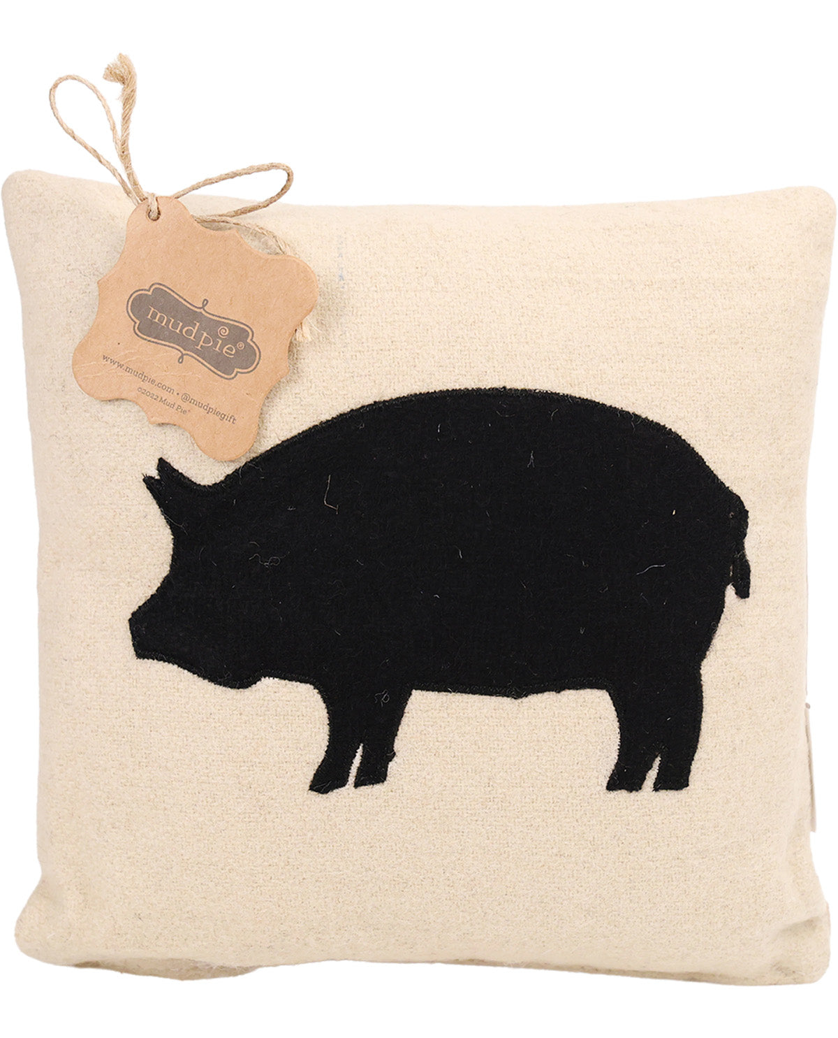 Decorative pillow with black pig silhouette and a tag on a white background