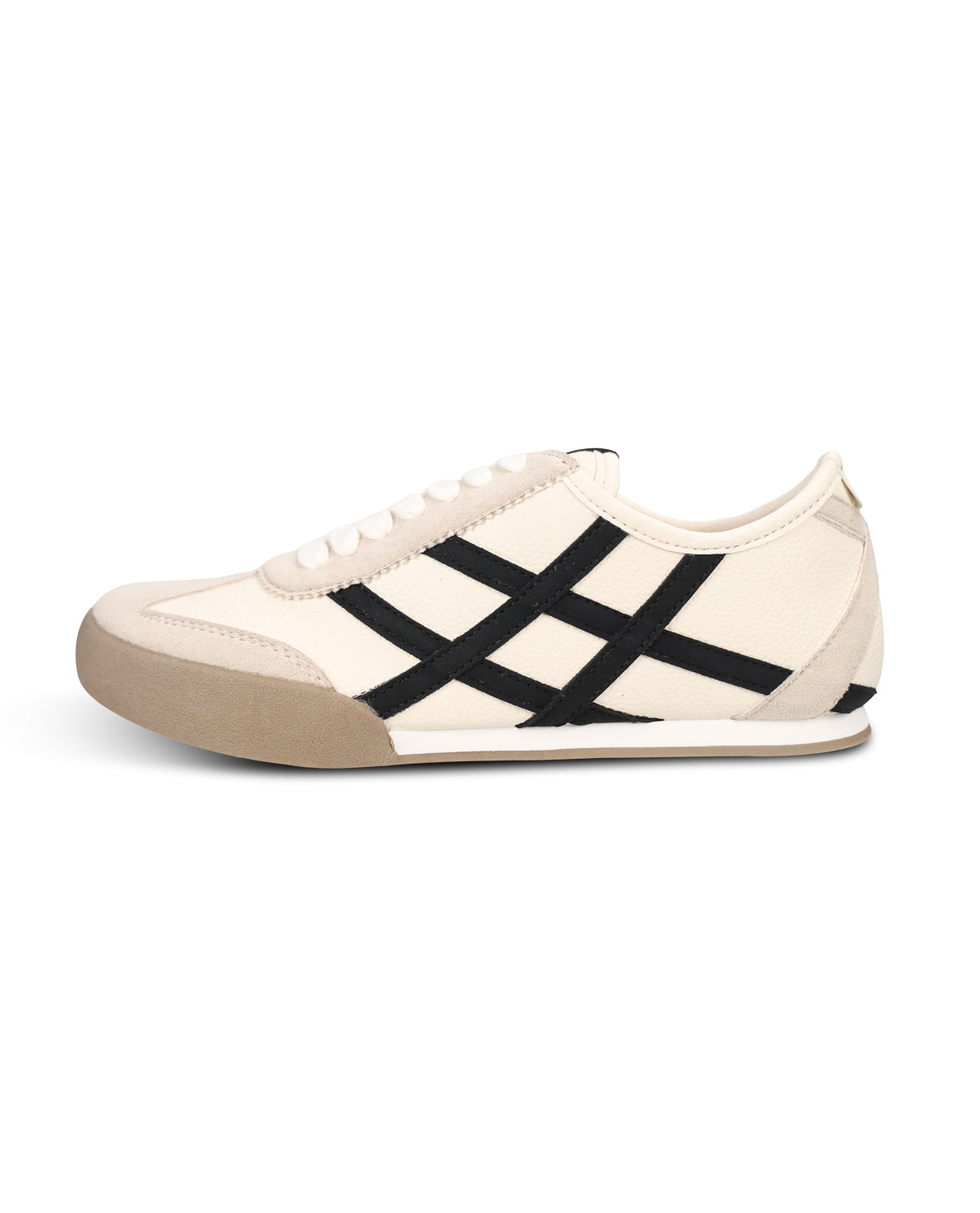 A low-top sneaker in off-white canvas with black diagonal stripes across the side, white laces, and a beige rubber toe cap and sole, shown from a side profile on a white background.