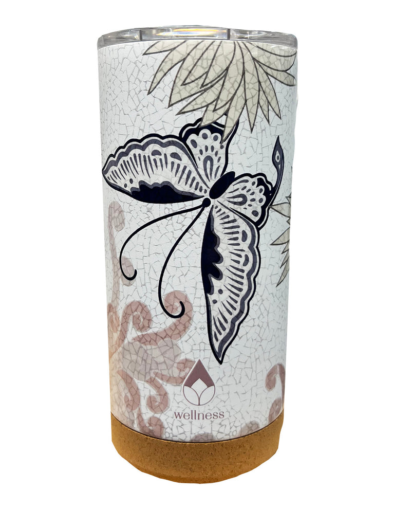 A tall insulated tumbler with a white crackle pattern, featuring a large black and white butterfly design, botanical leaf illustrations, and a cork base. The Wellness logo is printed near the bottom.