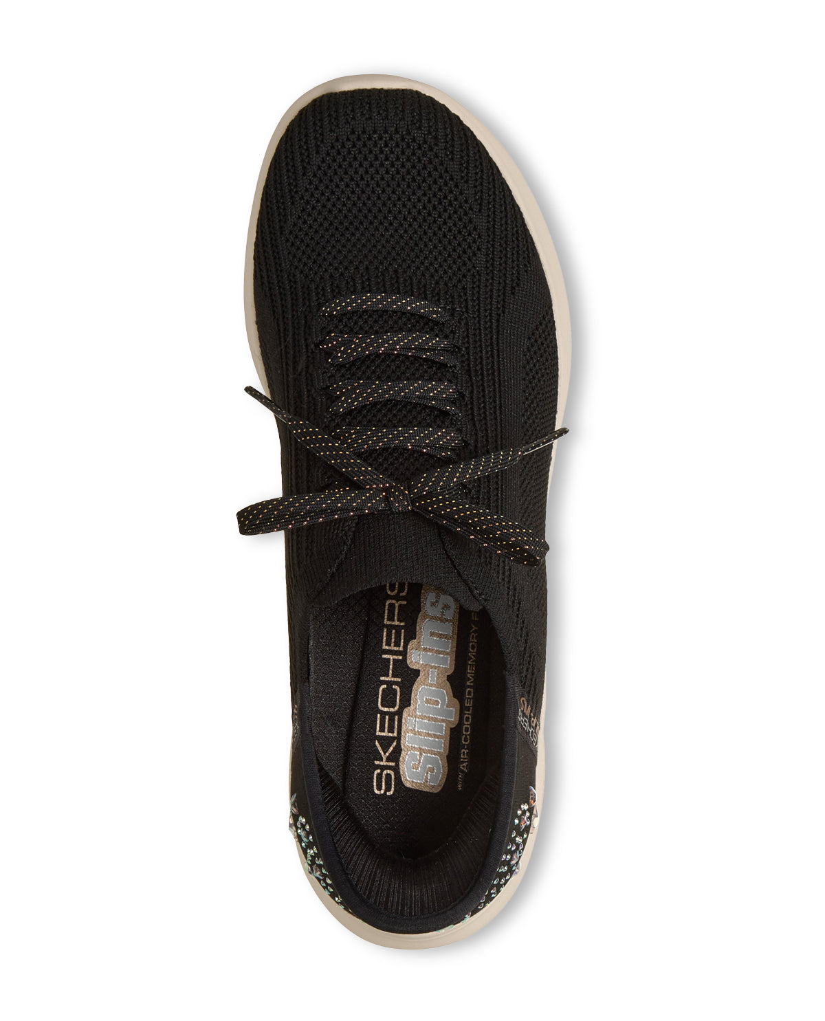 Black sneaker with visible "SKECHERS" brand logo on the inner sole on a white background.
