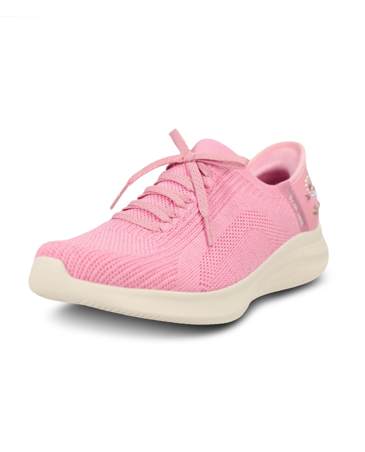 A pink knit slip-on sneaker with matching pink laces and a thick cream-colored sole, shown from a three-quarters angle on a white background.