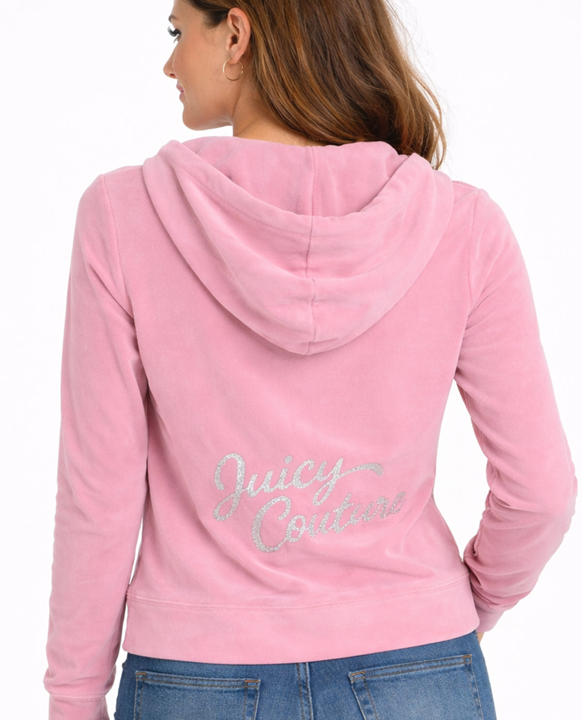 Pink hoodie with 'Juicy Couture' text on the back, worn by a person.