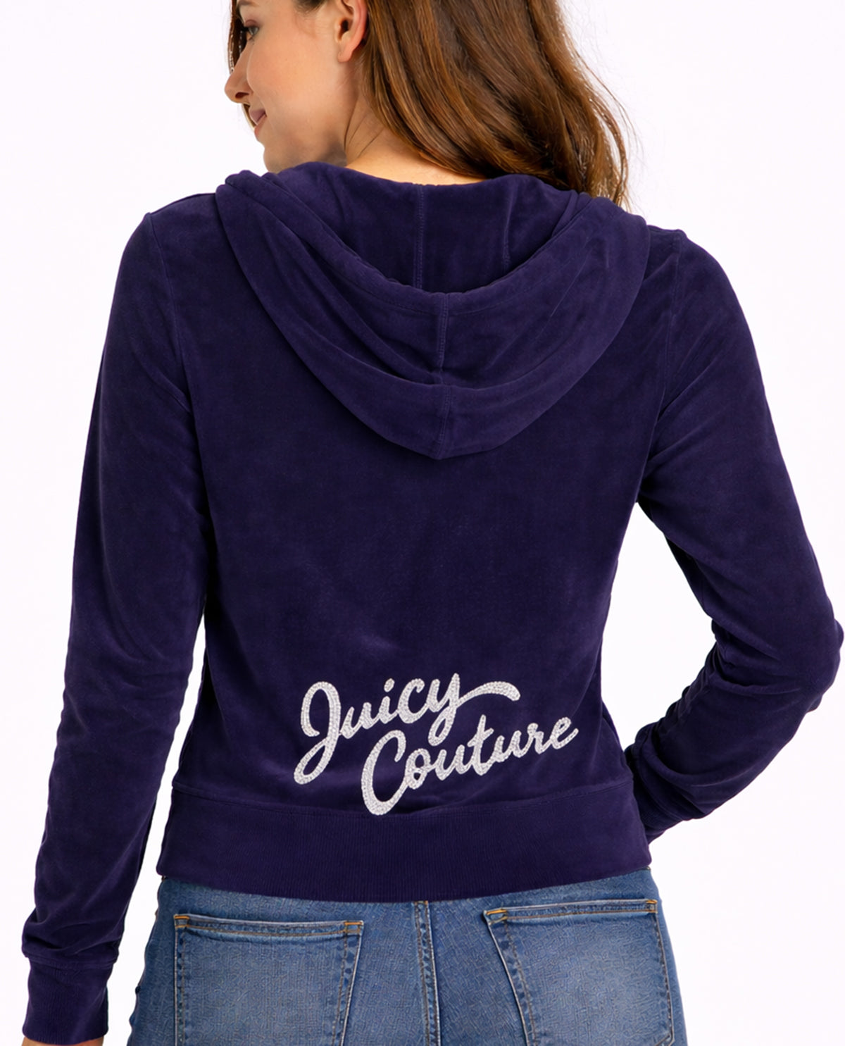Navy hoodie with 'Juicy Couture' logo on the back, worn by a person.