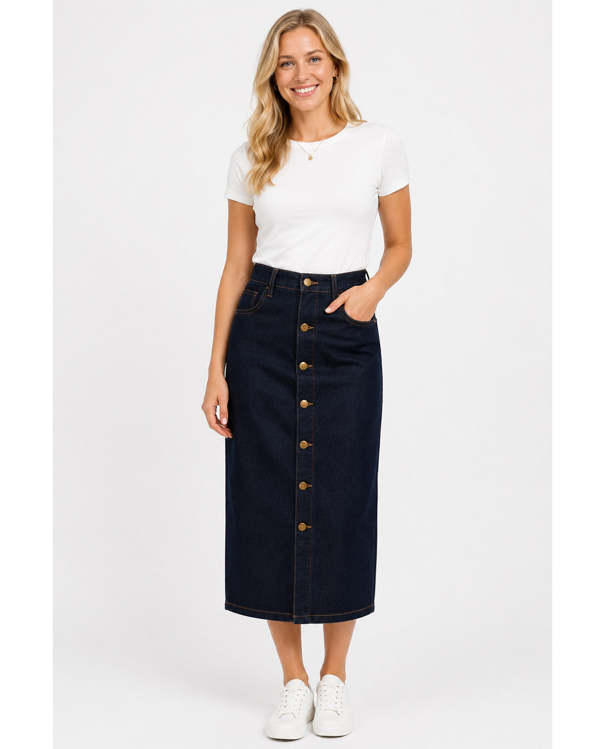 Woman wearing a white t-shirt and dark denim skirt with button details on a white background