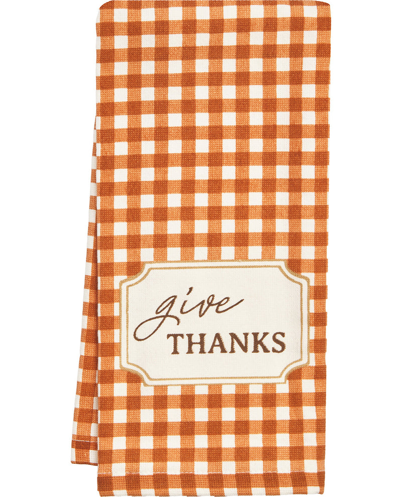 Orange and white checkered towel with 'give THANKS' text on a white background