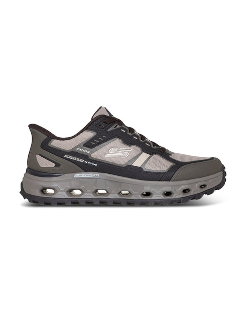 Light gray sneaker with textured design on a white background