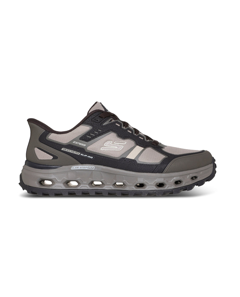 Light gray sneaker with textured design on a white background