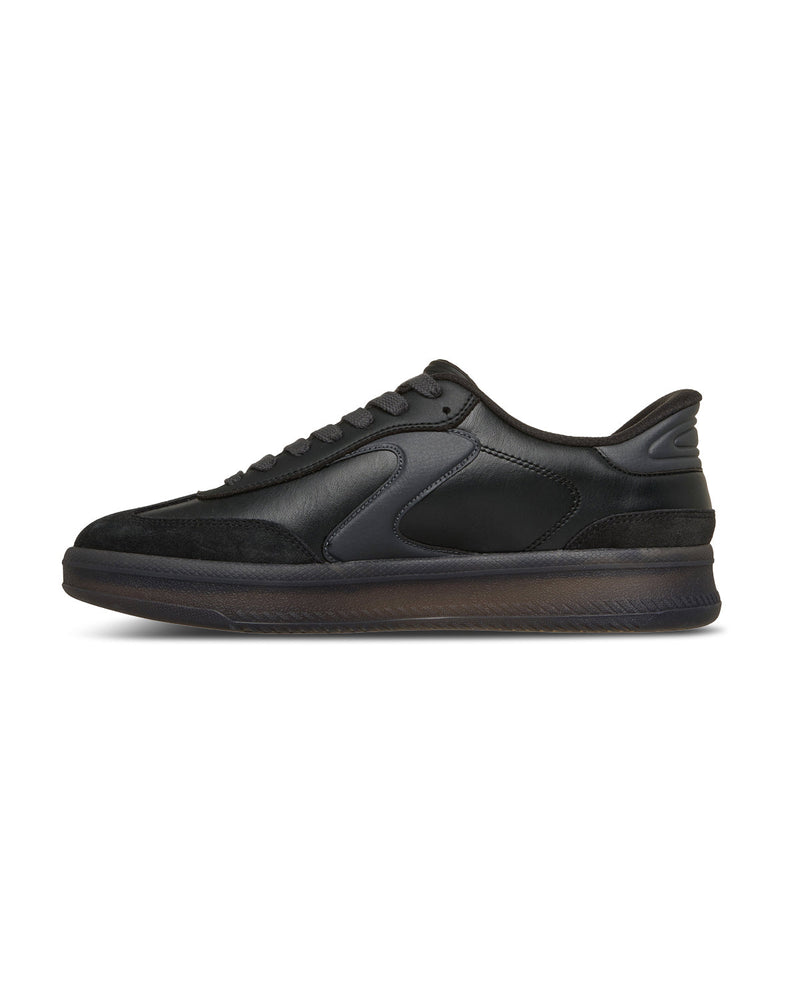 Black slip-on sneaker with Skechers logo on a white background