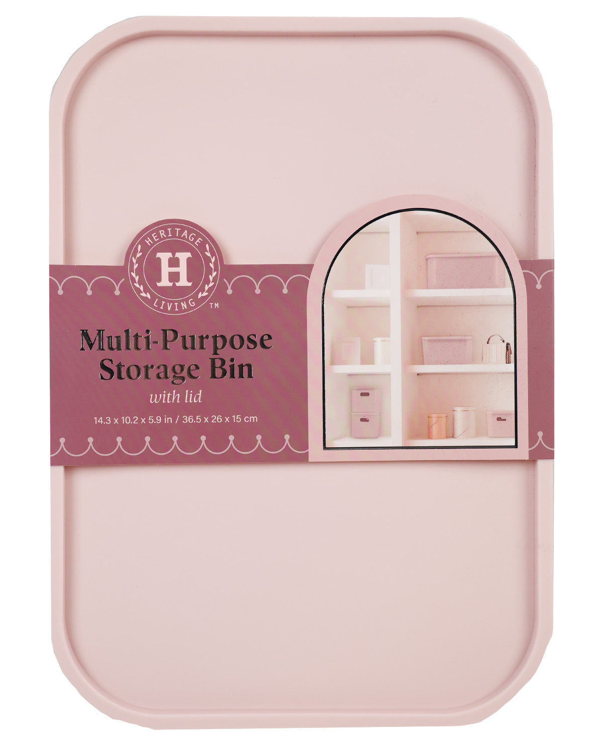 A pink multi-purpose storage bin with lid by Heritage Living, featuring a dusty rose paper label with product details and a small arched window illustration showing shelves inside.