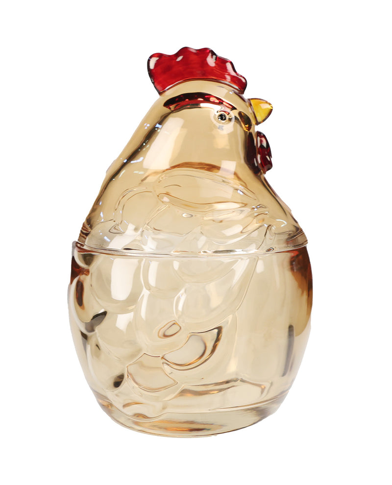 A decorative glass container shaped like a rooster, featuring a transparent amber-tinted body with a red comb and yellow beak, isolated on a white background.