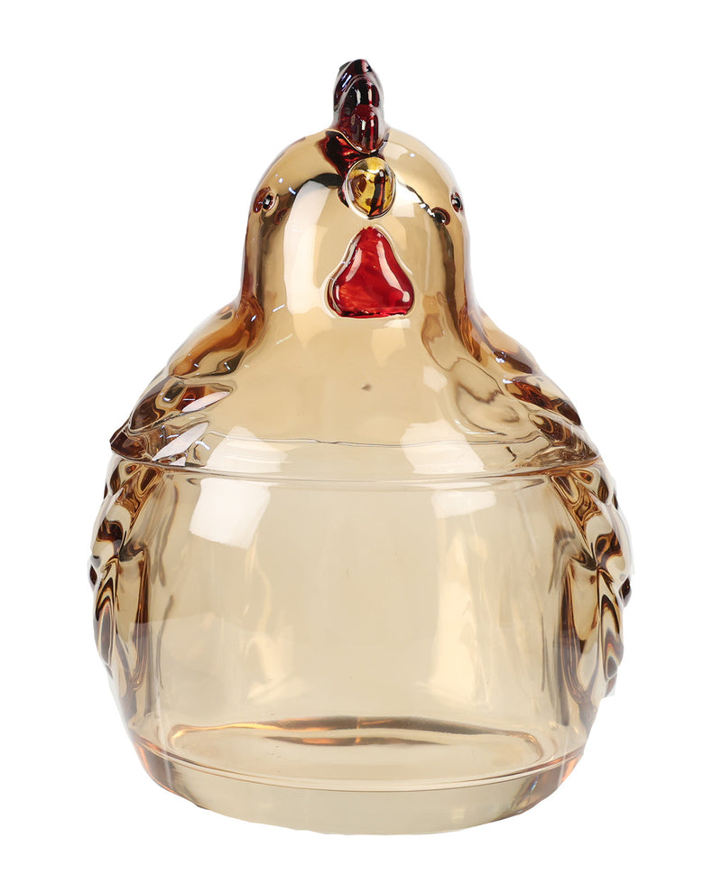 A decorative glass lidded container shaped like a chicken, featuring a transparent amber-tinted body with a red beak and comb detail, isolated on a white background.