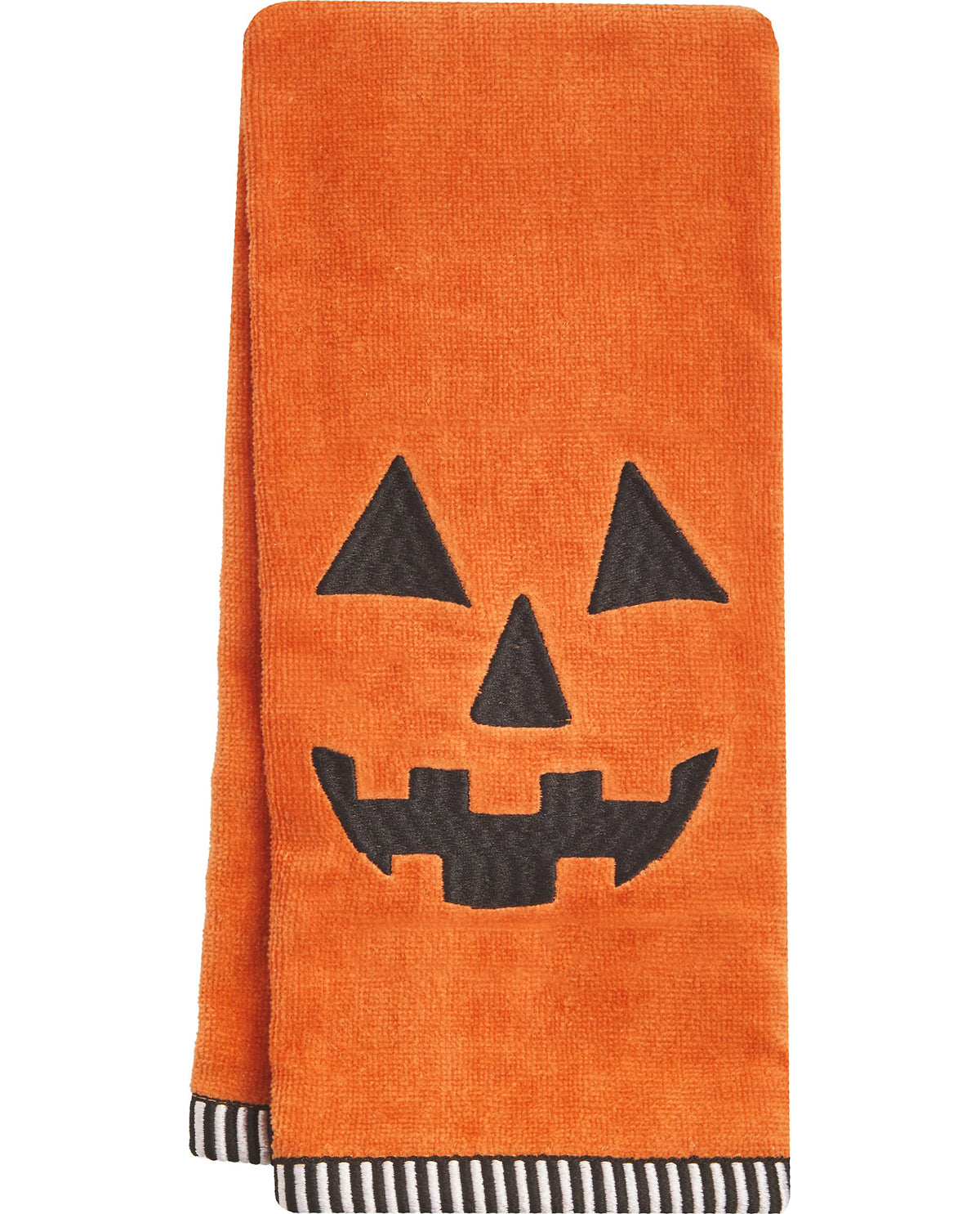 Orange towel with a jack-o'-lantern face design on a white background