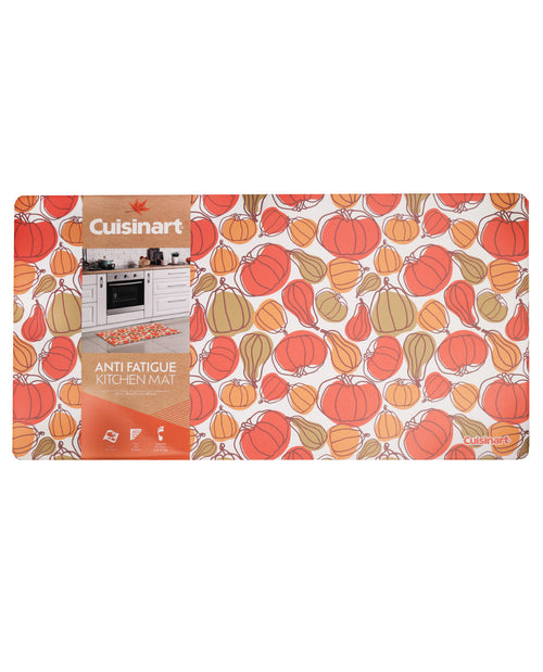 Cuisinart anti-fatigue kitchen mat featuring a colorful pattern of orange, red, and beige pumpkins and gourds on a white background, with a small kitchen scene graphic and product details printed on the left side.