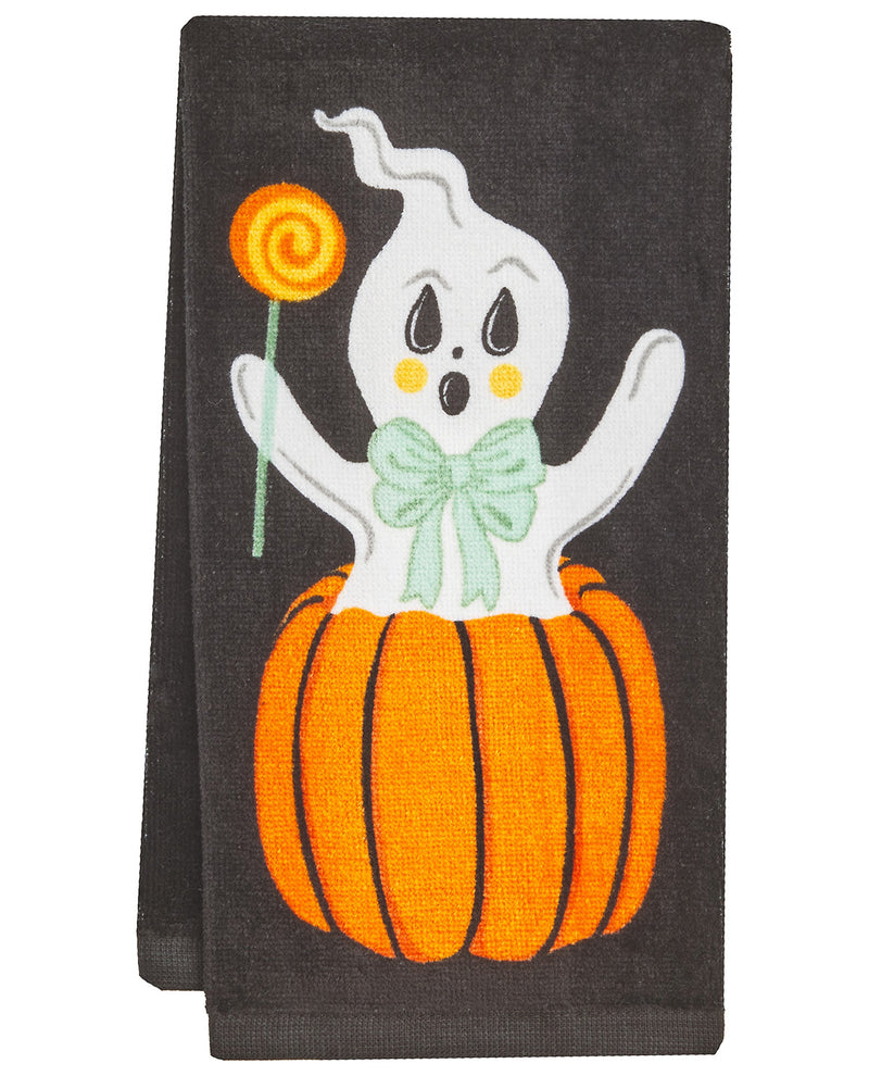 A dark charcoal gray kitchen towel featuring a festive Halloween design of a white ghost with a mint green bow and yellow cheeks popping out of an orange pumpkin, while holding a yellow spiral lollipop.