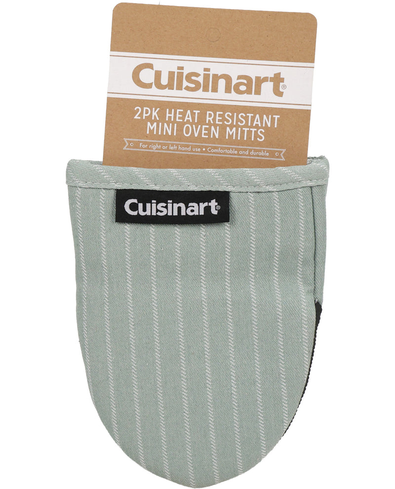 A Cuisinart heat resistant mini oven mitt in a pale sage green color with a subtle white textured stripe pattern, shown with its brown cardboard packaging header card.