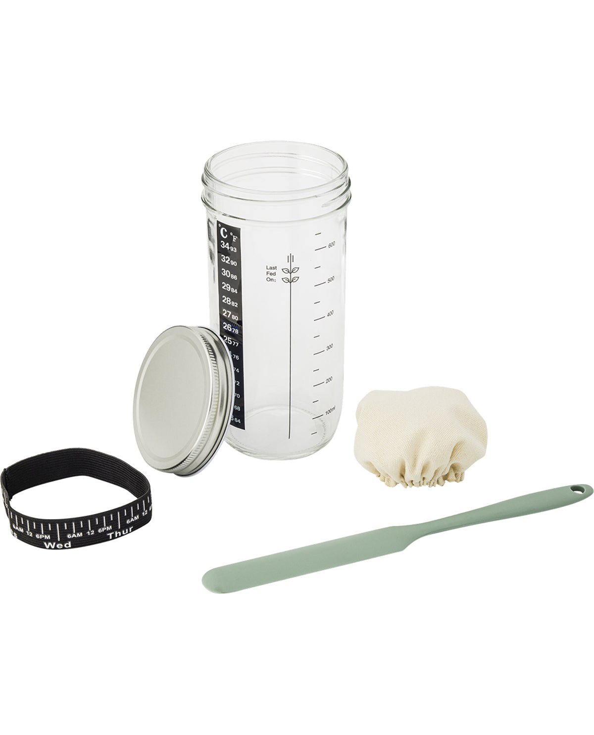 Container with measuring scale, lid, spatula, and white powder on a white background