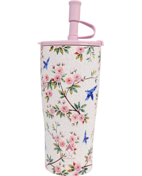 Floral-patterned tumbler with a pink lid on a white background