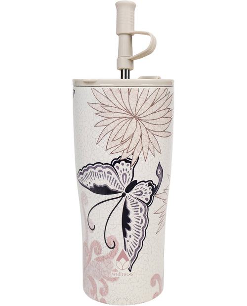 Tumbler with butterfly and floral design on a white background