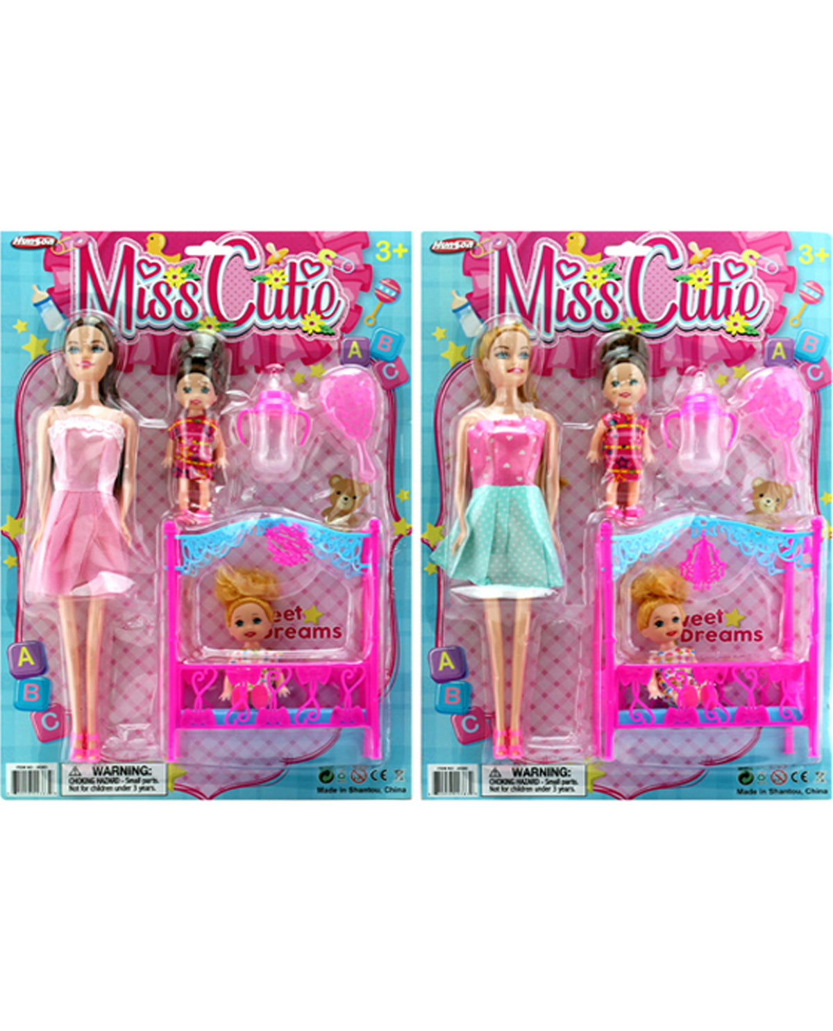 Two packaged Miss Cuten doll sets side by side on a white background. Each set includes a blonde doll in a pink and teal dress with a pink toy bed, accessories, and a pink background card.