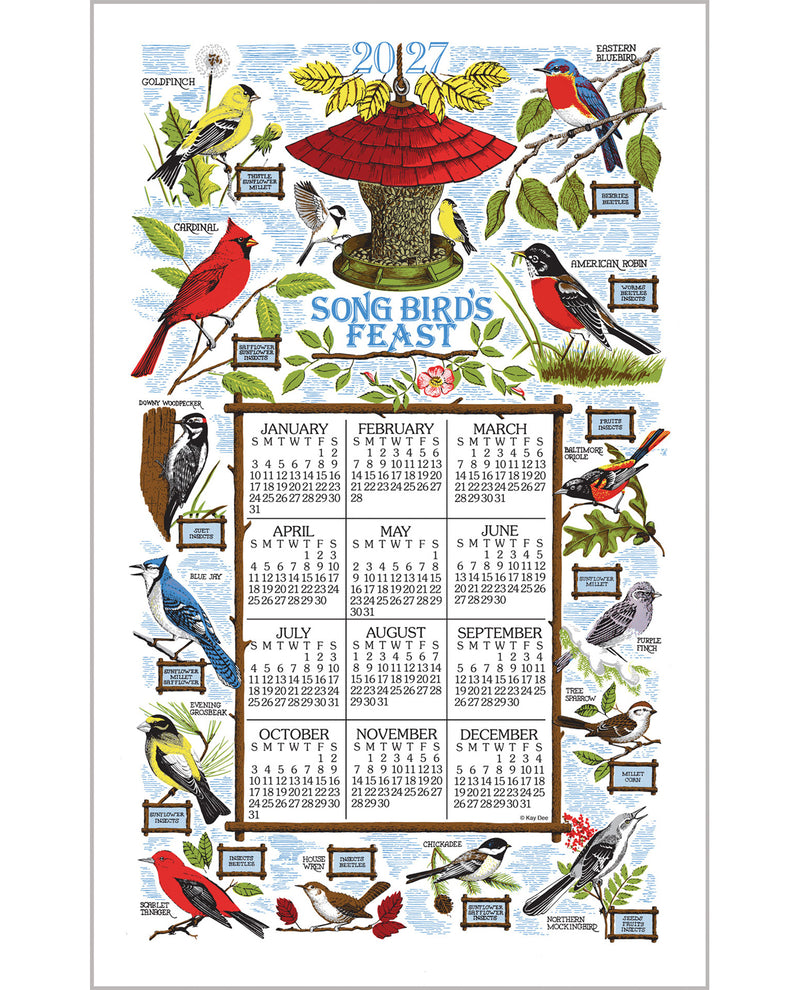 A 2027 Song Birds Feast calendar featuring a grid of 12 monthly sections surrounded by colorful illustrations of songbirds, a red bird feeder, and green leaves on a light blue background.