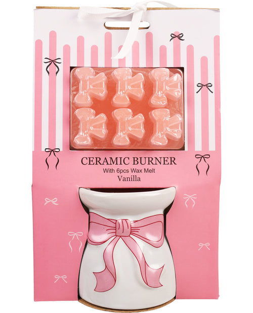 Ceramic burner with wax melts in a pink packaging