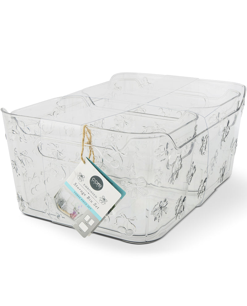 Clear storage bin with patterned design and a tag on a white background