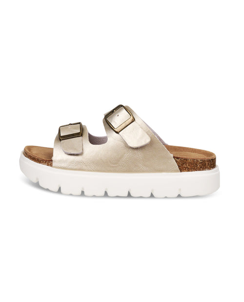 Gold sandal with gold buckles on a white background