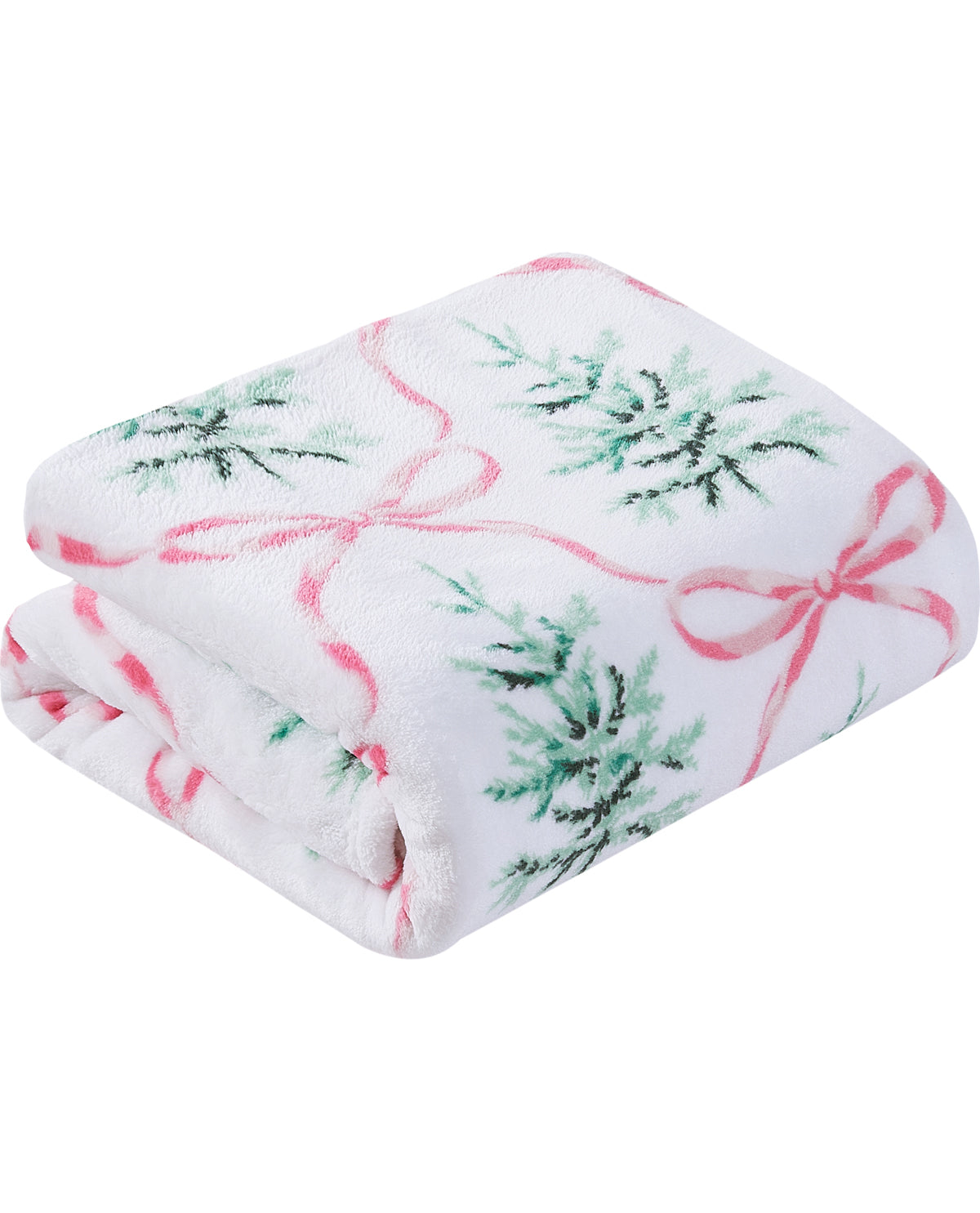 A folded white plush blanket featuring a festive pattern of green pine branches and pink ribbon bows, set against a plain white background.